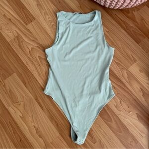 Blue Ribbed High Neck Bodysuit